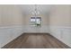 Bright dining room with hardwood floors and chandelier at 152 Hillwood Dr, Sanford, NC 27332