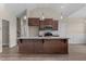 Kitchen with large island and pendant lighting at 152 Hillwood Dr, Sanford, NC 27332