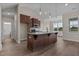 Kitchen with island and stainless steel appliances at 152 Hillwood Dr, Sanford, NC 27332