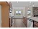 View of kitchen with stainless steel appliances and breakfast nook at 152 Hillwood Dr, Sanford, NC 27332