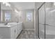 Bathroom boasts double vanity, and a large shower at 114 Hillwood Dr, Sanford, NC 27332