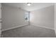 Simple bedroom with carpet and window at 114 Hillwood Dr, Sanford, NC 27332