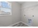 Laundry room with shelving and window at 114 Hillwood Dr, Sanford, NC 27332