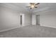 Bright bedroom with ceiling fan and access to bathroom at 114 Hillwood Dr, Sanford, NC 27332