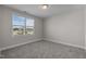 Bedroom with carpet and large window at 114 Hillwood Dr, Sanford, NC 27332