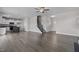 Open living room with hardwood floors and kitchen view at 114 Hillwood Dr, Sanford, NC 27332