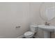Modern powder room with pedestal sink and toilet at 114 Hillwood Dr, Sanford, NC 27332