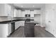 Modern kitchen with an island and white cabinets at 114 Hillwood Dr, Sanford, NC 27332