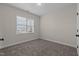 Simple bedroom with carpet and neutral color walls at 58 Hillwood Dr, Sanford, NC 27332