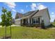 House exterior showcasing landscaping and stone accents at 58 Hillwood Dr, Sanford, NC 27332