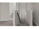 Stairs leading to upper level with bathroom access at 58 Hillwood Dr, Sanford, NC 27332