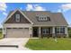 House exterior with neutral colors and a two-car garage at 58 Hillwood Dr, Sanford, NC 27332