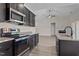 Modern kitchen with stainless steel appliances and granite countertops at 58 Hillwood Dr, Sanford, NC 27332