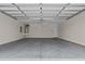 Spacious two-car garage with storage shelving and water heater at 58 Hillwood Dr, Sanford, NC 27332
