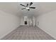 Large bonus room with carpet and ceiling fan at 58 Hillwood Dr, Sanford, NC 27332