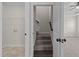Laundry area with shelving and access to stairs at 58 Hillwood Dr, Sanford, NC 27332
