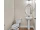 Small bathroom with pedestal sink and toilet at 147 Hillwood Dr, Sanford, NC 27332