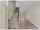 Bright entryway with hardwood floors and staircase at 147 Hillwood Dr, Sanford, NC 27332