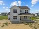 Two-story house with white siding, gray roof, and covered porch at 147 Hillwood Dr, Sanford, NC 27332