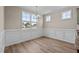Bright dining room with hardwood floors and wainscoting at 147 Hillwood Dr, Sanford, NC 27332