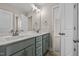 Double vanity bathroom with gray cabinets and quartz countertop at 147 Hillwood Dr, Sanford, NC 27332