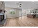 Spacious living room with fireplace and kitchen view at 147 Hillwood Dr, Sanford, NC 27332