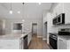 Bright kitchen with granite countertops and stainless steel range at 50 Oleander Ln, Sanford, NC 27332