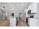 Open concept kitchen featuring a large island and hardwood floors at 50 Oleander Ln, Sanford, NC 27332