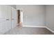 Bedroom with double door closet and carpet flooring at 50 Oleander Ln, Sanford, NC 27332