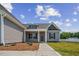 House exterior with front porch and landscaping at 50 Oleander Ln, Sanford, NC 27332