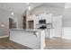 Modern kitchen with stainless steel appliances and granite countertops at 50 Oleander Ln, Sanford, NC 27332