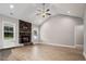 Bright living room with hardwood floors and stone fireplace at 50 Oleander Ln, Sanford, NC 27332