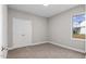 Bedroom with double door closet and carpet flooring at 50 Oleander Ln, Sanford, NC 27332