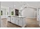 Island kitchen with granite countertops and stainless steel appliances at 50 Oleander Ln, Sanford, NC 27332