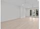 Spacious basement room with hardwood floors and backyard access at 1435 Duplin Rd, Raleigh, NC 27607