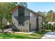 Modern home exterior with gray siding and wood accents at 1435 Duplin Rd, Raleigh, NC 27607