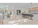 Open concept kitchen with island, dining area, and living room at 1435 Duplin Rd, Raleigh, NC 27607