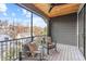 Private balcony with wooden ceiling and screened sides at 1435 Duplin Rd, Raleigh, NC 27607