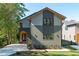 Modern two-story home with gray siding and wood accents at 1435 Duplin Rd, Raleigh, NC 27607