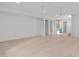 Bright, open basement with hardwood floors and access to other rooms at 1435 Duplin Rd, Raleigh, NC 27607