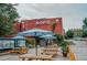 NOFO @ The Pig exterior with outdoor seating at 1435 Duplin Rd, Raleigh, NC 27607