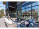 Large deck with seating area and a view into the house at 1435 Duplin Rd, Raleigh, NC 27607