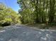 Wooded lot with street view, ready to build your dream home at 5308 Parkwood Dr, Raleigh, NC 27612