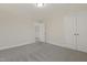 Spacious bedroom with double doors leading to another room at 304 Ford Meadows Dr, Garner, NC 27529