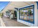 Retail storefront with blue-framed windows and clothing display at 125 Sugar Run Dr # 26, Fuquay Varina, NC 27526