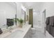 Modern bathroom featuring double vanity, shower, and decorative curtain at 3401 Makers Cir, Raleigh, NC 27612