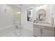 Modern bathroom featuring a glass shower, gold accents, and a stylish vanity at 3401 Makers Cir, Raleigh, NC 27612