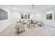 Bonus or Gathering room with comfortable seating and large windows at 3401 Makers Cir, Raleigh, NC 27612