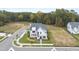 An aerial view of a modern two-story home in a new development at 3401 Makers Cir, Raleigh, NC 27612