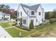 Modern farmhouse style house exterior with landscaping and sidewalk at 3401 Makers Cir, Raleigh, NC 27612